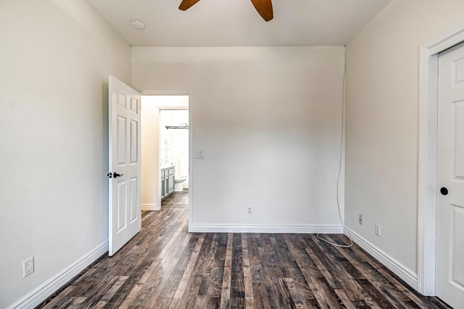 1571 Lemon Avenue Madera, CA 93637 - Photo 19 of 38 a view of a room with wooden floor