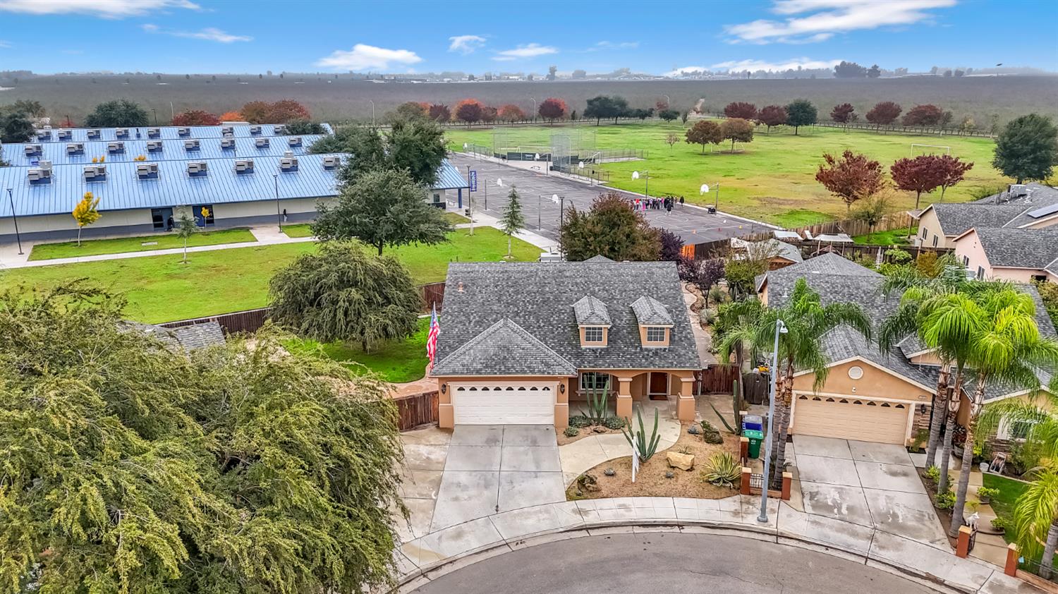 1571 Lemon Avenue Madera, CA 93637 - Photo 32 of 38 an aerial view of a house with a garden