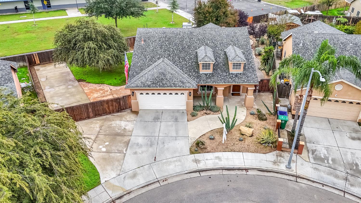 1571 Lemon Avenue Madera, CA 93637 - Photo 33 of 38 an aerial view of a house with a yard and lake view