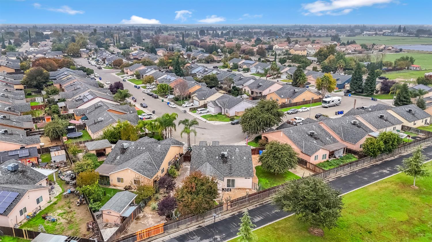 1571 Lemon Avenue Madera, CA 93637 - Photo 37 of 38 an aerial view of residential houses with outdoor space