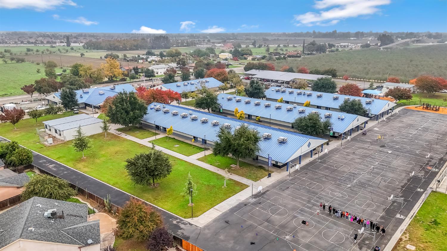 1571 Lemon Avenue Madera, CA 93637 - Photo 38 of 38 an aerial view of a city with lake
