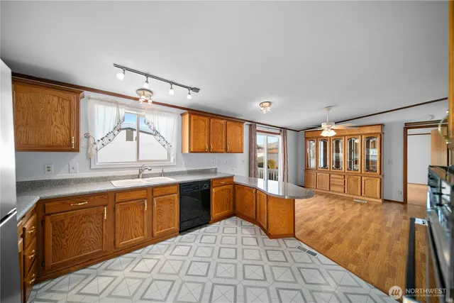 a large kitchen with a large window