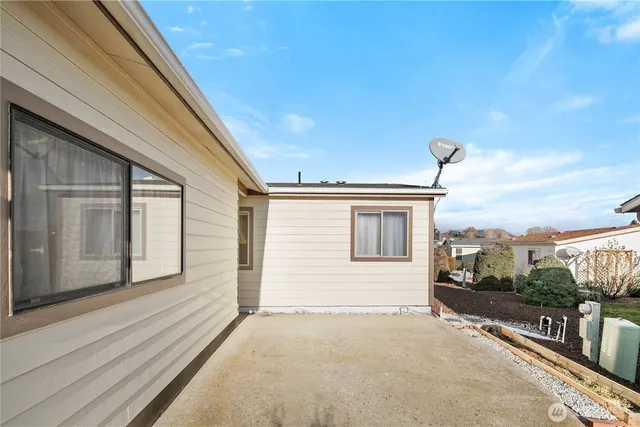 a view of a house with a street