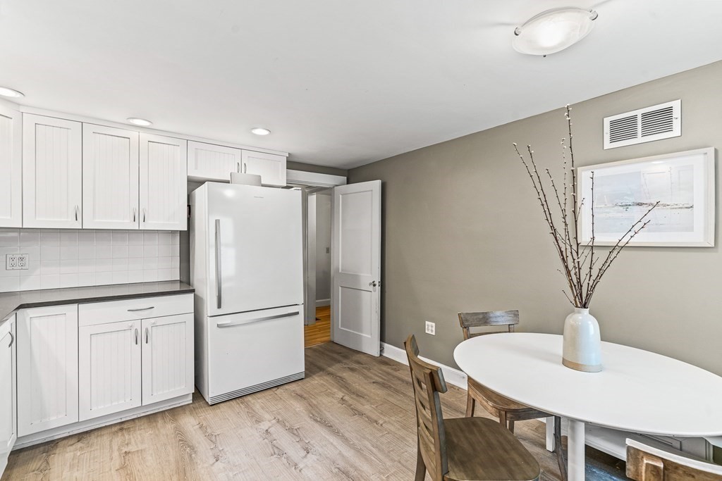 19 Stonebridge Road Wayland, MA 01778 - Photo 3 of 19 a kitchen with stainless steel appliances granite countertop a refrigerator a sink and a stove