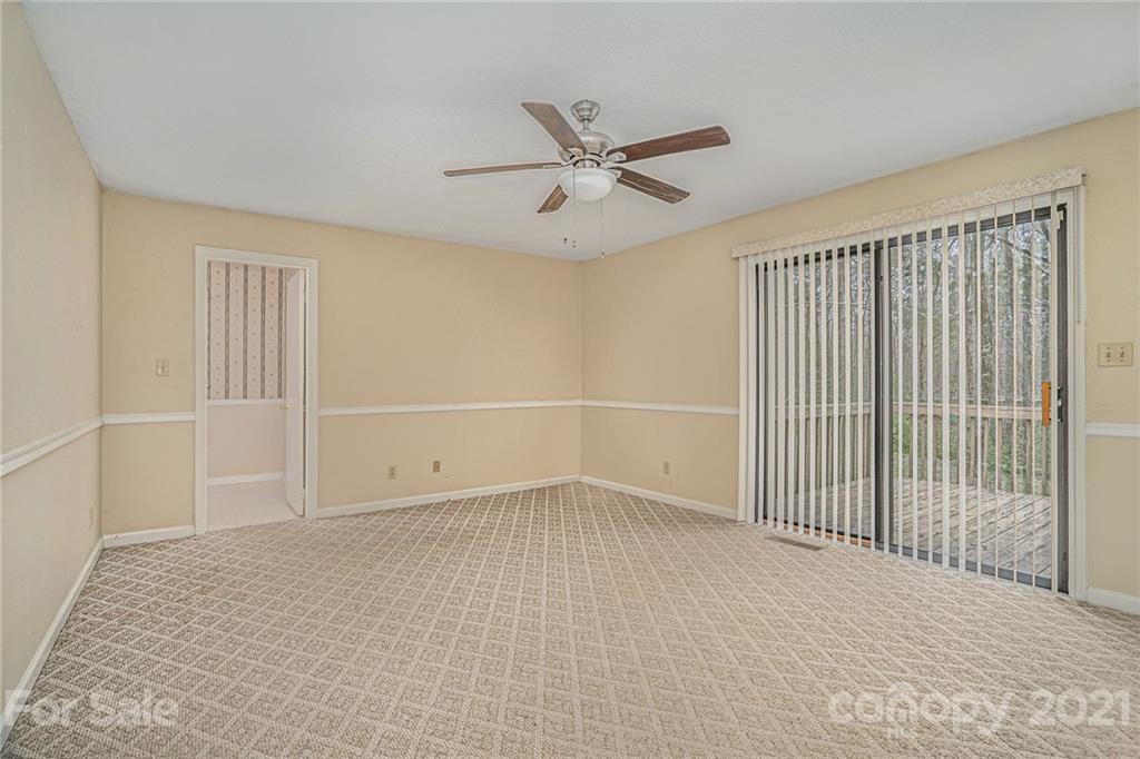 4325 Flowes Store Road Concord, NC 28025 - Photo 13 of 31 an empty room with fan