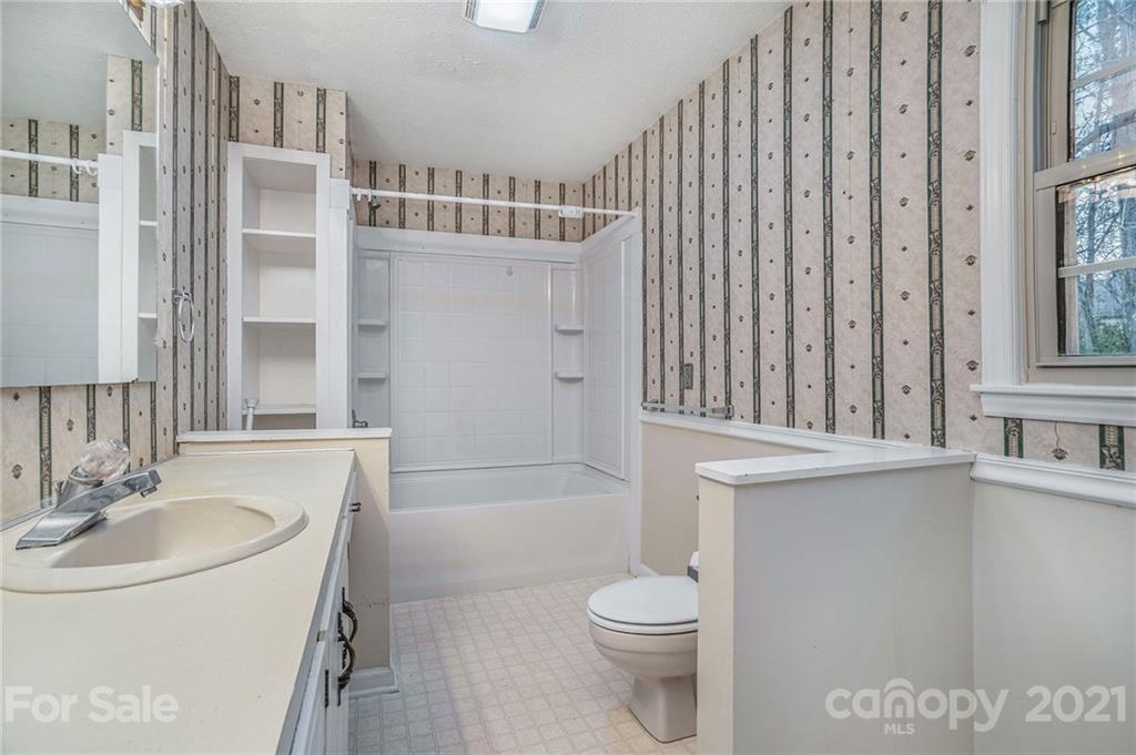 4325 Flowes Store Road Concord, NC 28025 - Photo 16 of 31 a bathroom with a sink toilet and shower