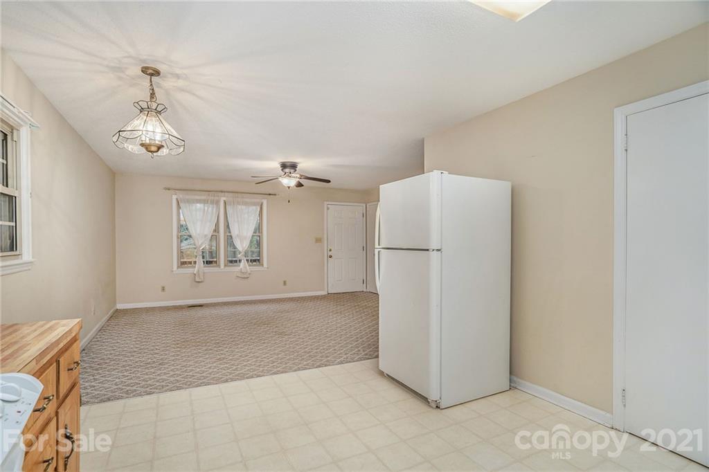 4325 Flowes Store Road Concord, NC 28025 - Photo 22 of 31 a view of a refrigerator in a kitchen