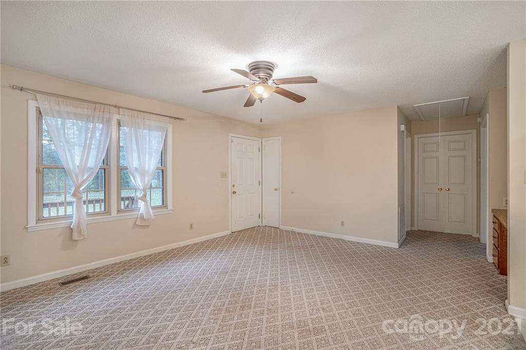4325 Flowes Store Road Concord, NC 28025 - Photo 24 of 31 a view of an empty room with a window