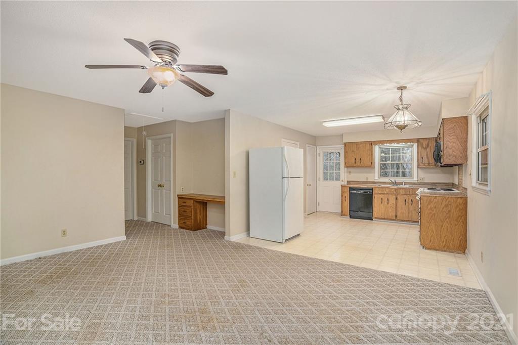 4325 Flowes Store Road Concord, NC 28025 - Photo 25 of 31 a view of a kitchen with a sink and cabinet