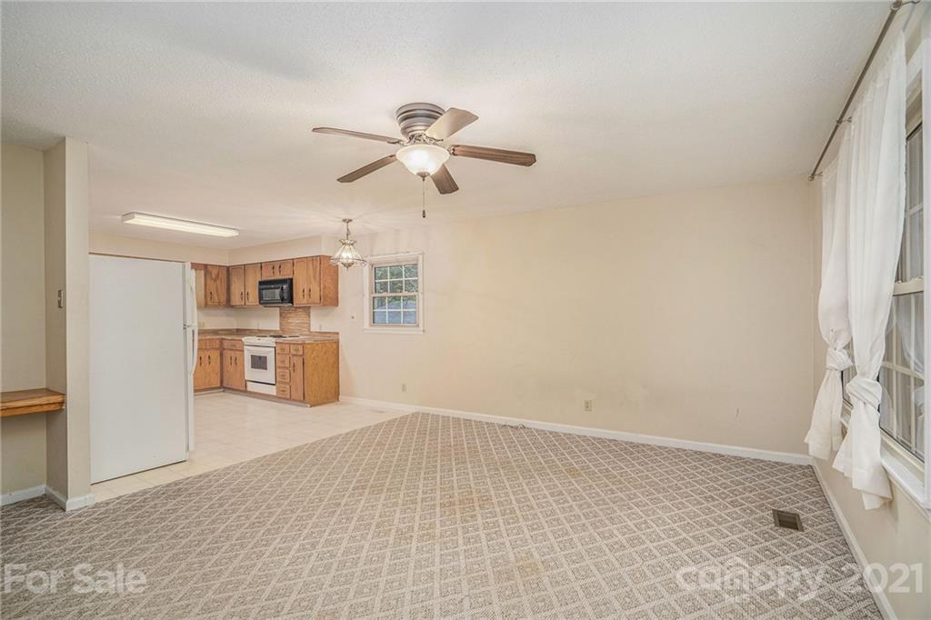 4325 Flowes Store Road Concord, NC 28025 - Photo 26 of 31 a view of a kitchen with a sink and a window