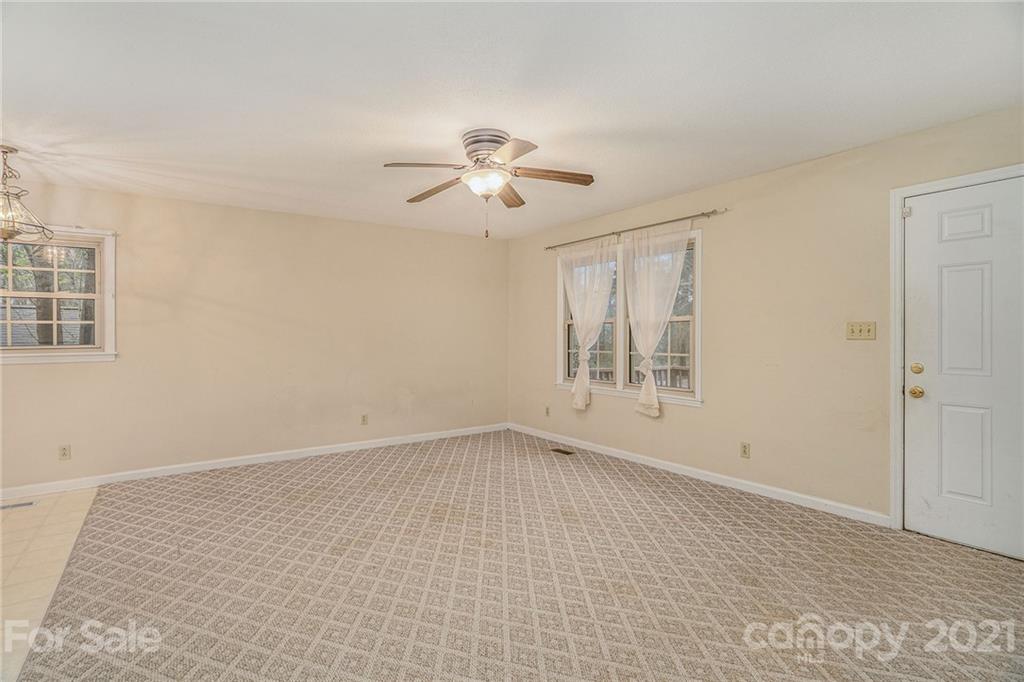 4325 Flowes Store Road Concord, NC 28025 - Photo 27 of 31 a view of an empty room with a window