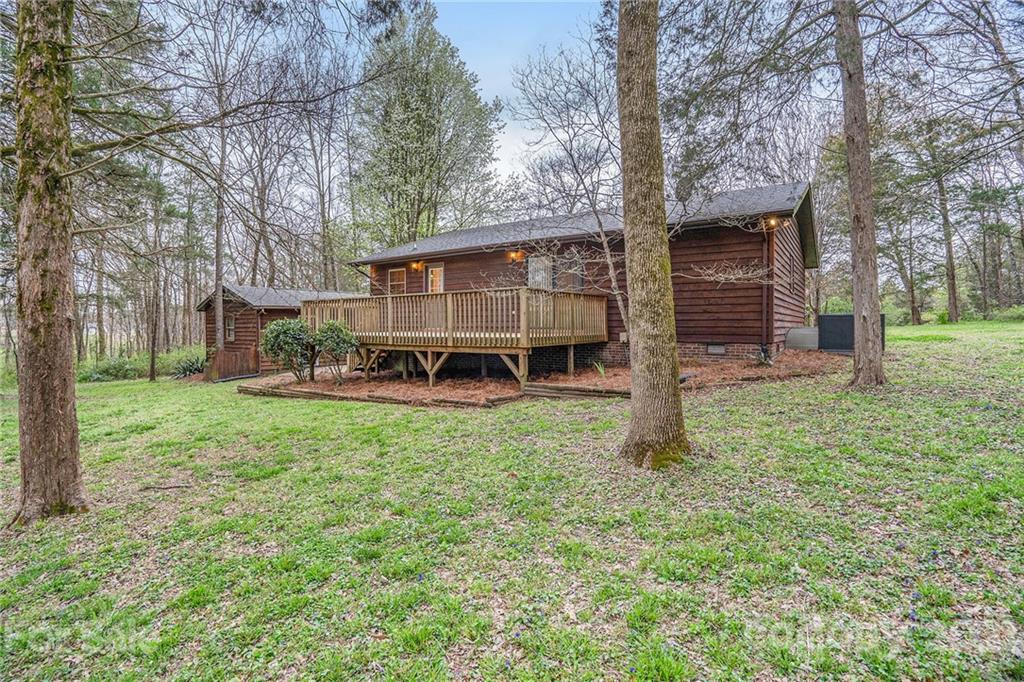 4325 Flowes Store Road Concord, NC 28025 - Photo 5 of 31 a front view of a house with a yard