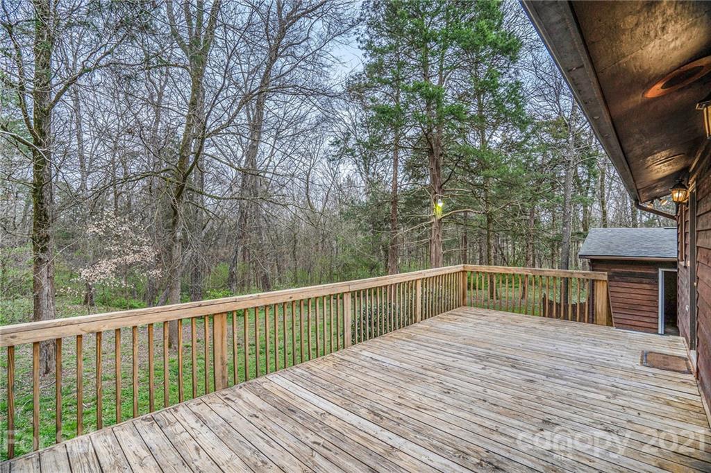 4325 Flowes Store Road Concord, NC 28025 - Photo 9 of 31 a view of a balcony with wooden floor and fence