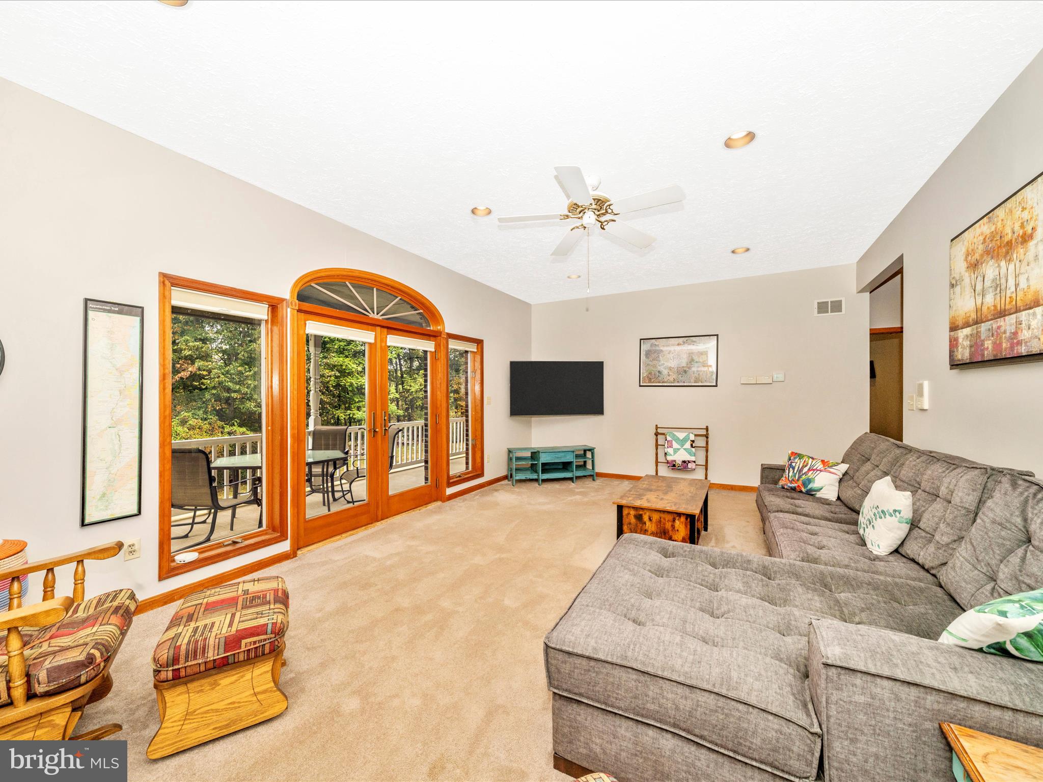 17879 Harbaugh Valley Road Sabillasville, MD 21780 - Photo 21 of 64 a spacious bedroom with a large bed and a large window
