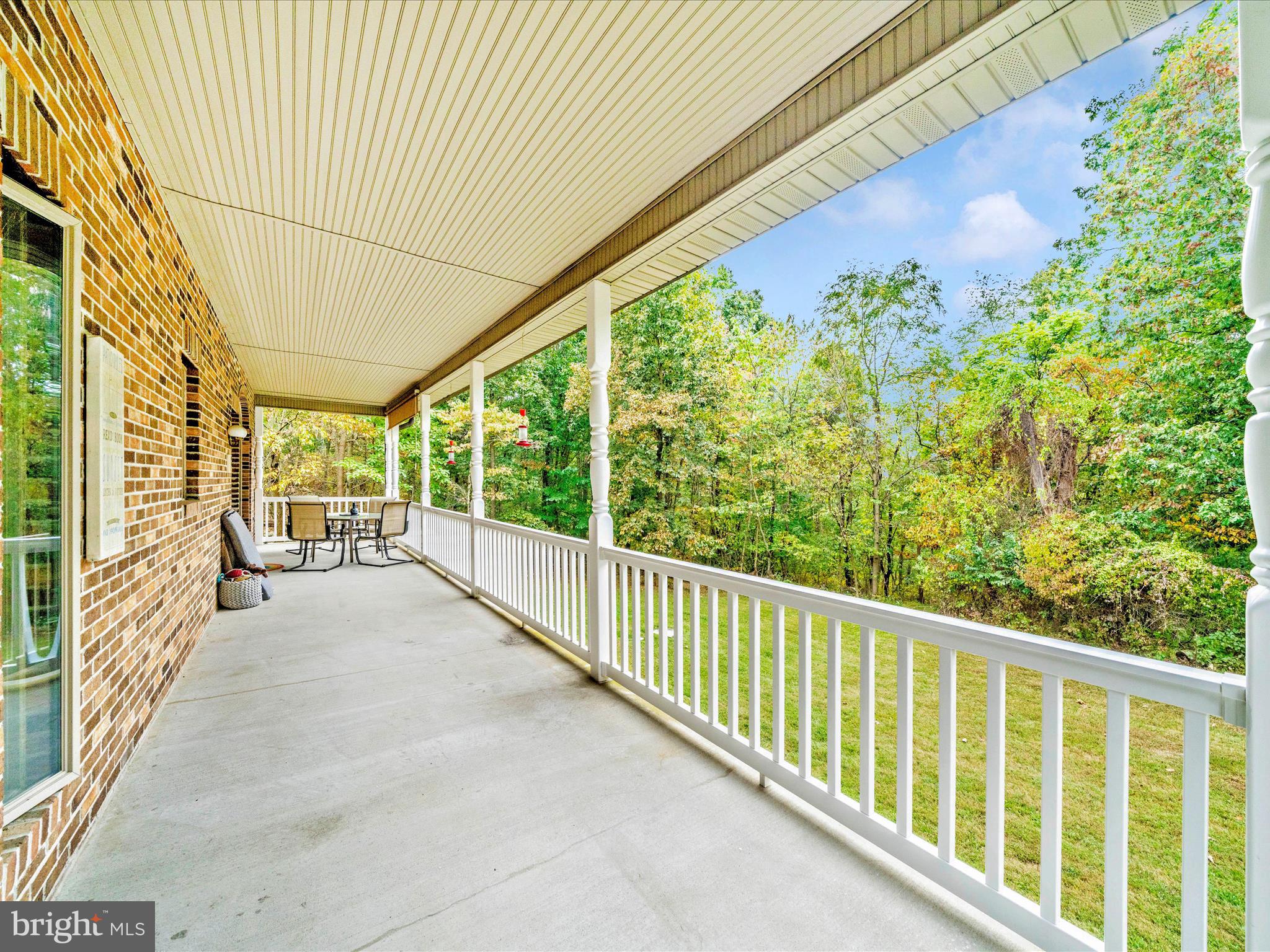 17879 Harbaugh Valley Road Sabillasville, MD 21780 - Photo 22 of 64 a view of porch with wooden floor in front of house