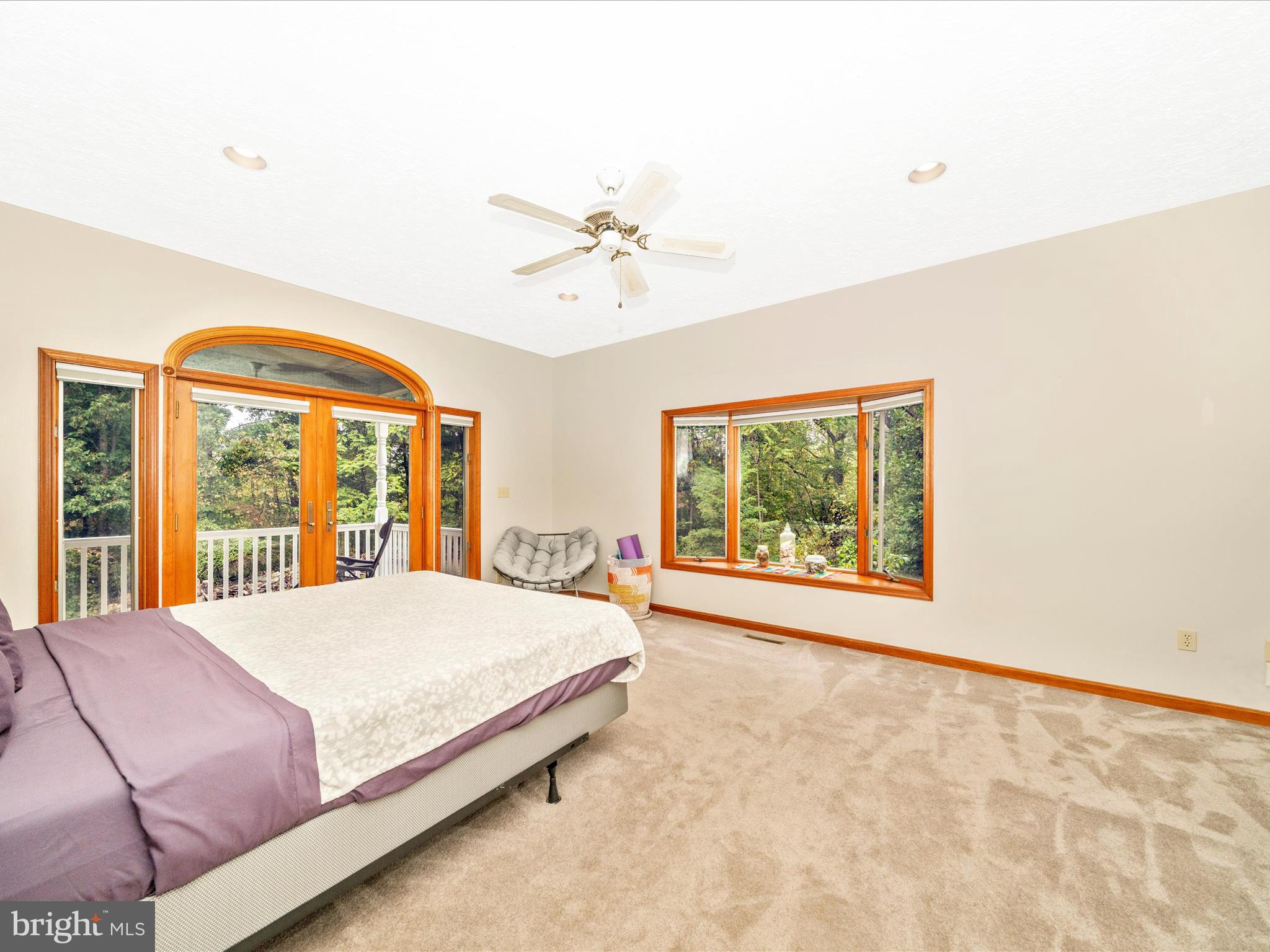 17879 Harbaugh Valley Road Sabillasville, MD 21780 - Photo 26 of 64 a bedroom with a large bed and a window