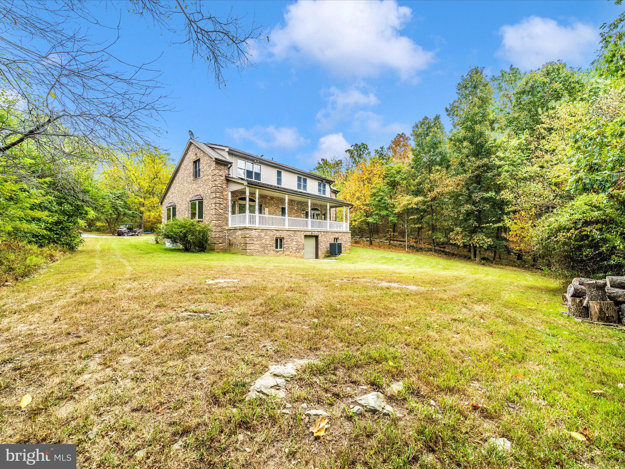 17879 Harbaugh Valley Road Sabillasville, MD 21780 - Photo 45 of 64 a view of a house with a yard