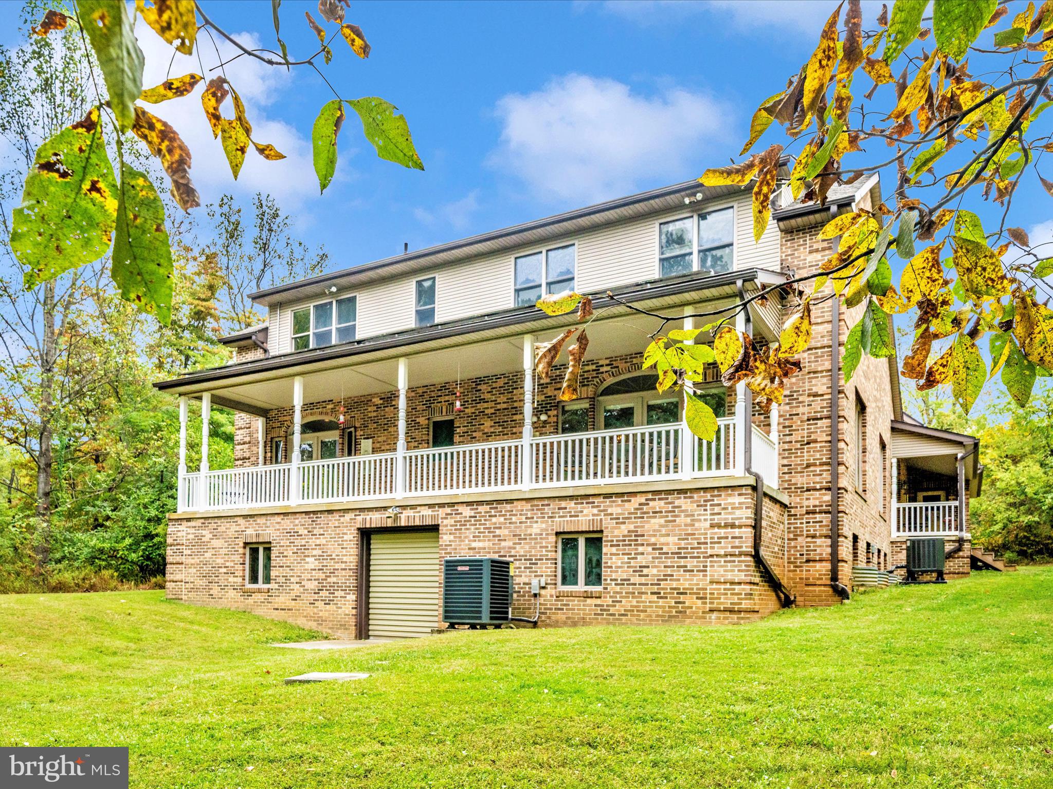 17879 Harbaugh Valley Road Sabillasville, MD 21780 - Photo 46 of 64 front view of a house with a yard
