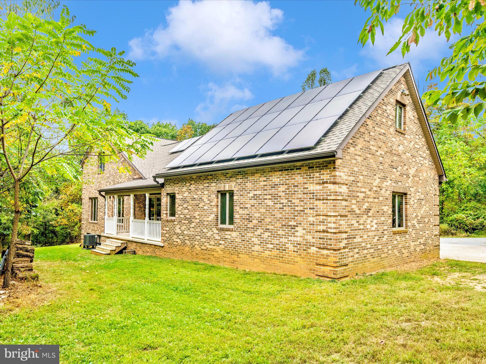 17879 Harbaugh Valley Road Sabillasville, MD 21780 - Photo 50 of 64 Partial Solar Array above side porch and Kitchen