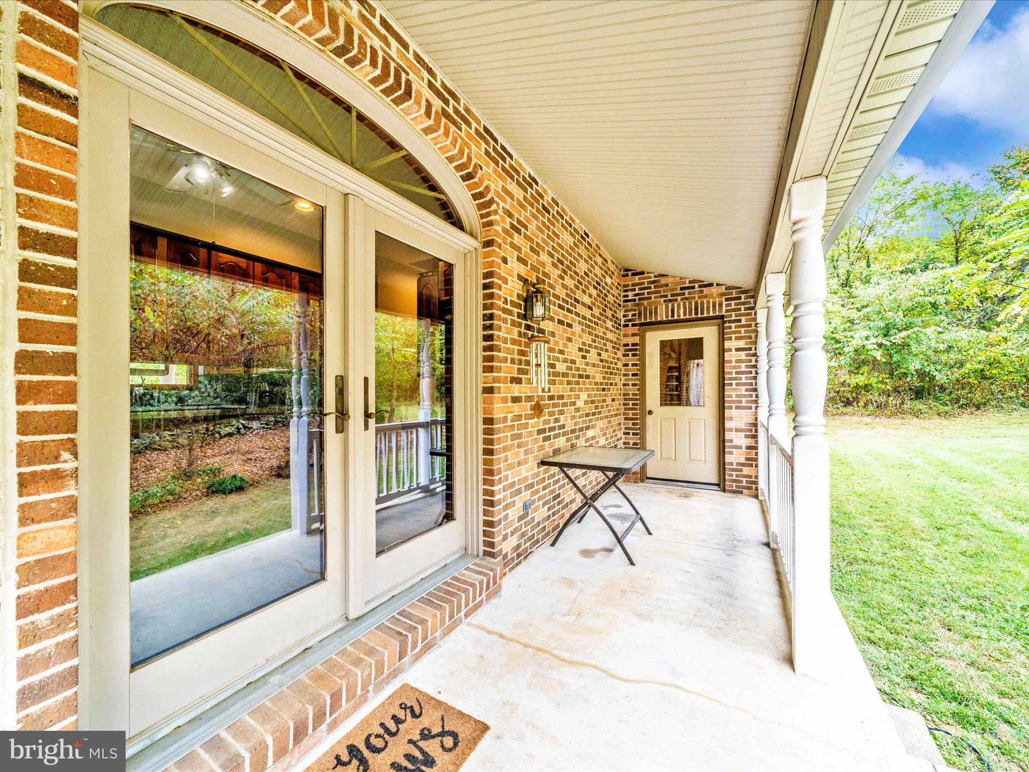 17879 Harbaugh Valley Road Sabillasville, MD 21780 - Photo 52 of 64 Side porch off kitchen for Alfresco dining