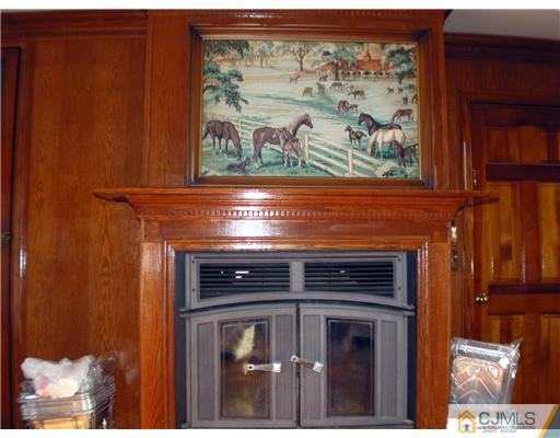 1232 West Farms Road Howell, NJ 07731 - Photo 19 of 23 a close view of a fireplace