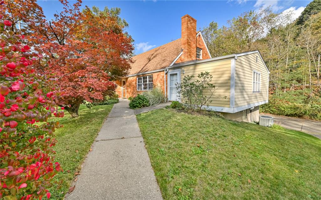 118 Lower Arrowhead Road Pittsburgh, PA 15237 - Photo 23 of 25 a view of a pathway with a house in the background