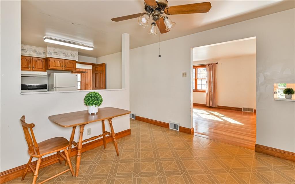118 Lower Arrowhead Road Pittsburgh, PA 15237 - Photo 6 of 25 a view of a dining room with furniture and wooden floor