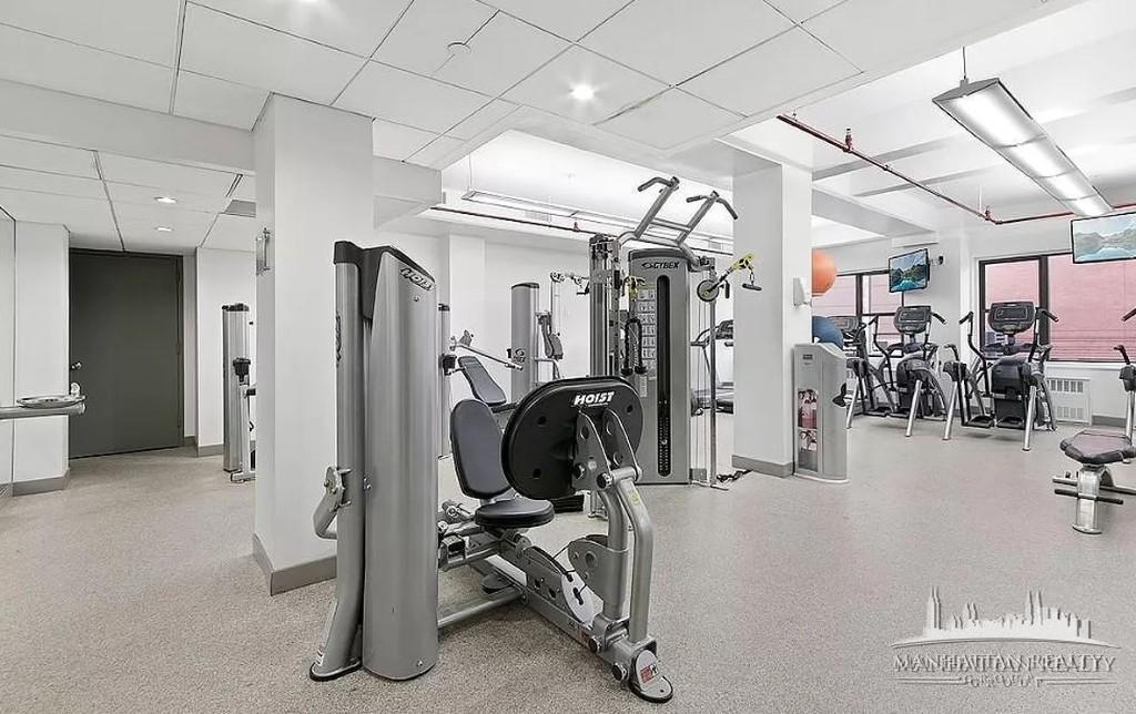 145 4th Avenue, Unit 9F Manhattan, NY 10003 - Photo 2 of 3 a view of a room with gym equipment