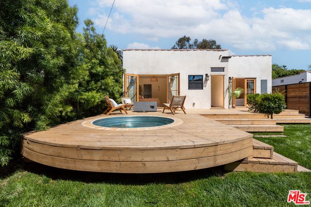 a kitchen with stainless steel appliances granite countertop a stove and a sink