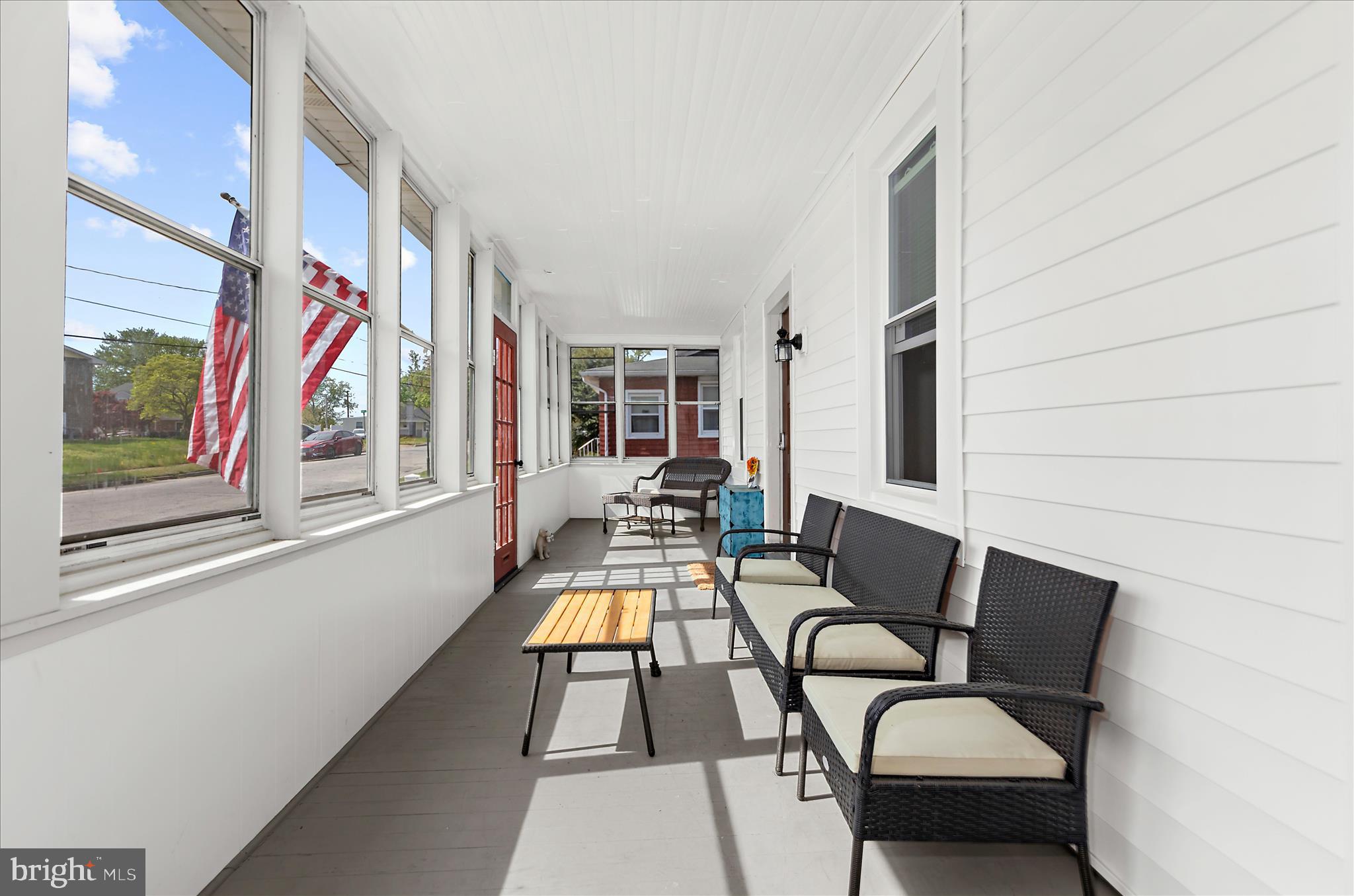 222 Wanda Road Pasadena, MD 21122 - Photo 4 of 34 a building outdoor space with seating area