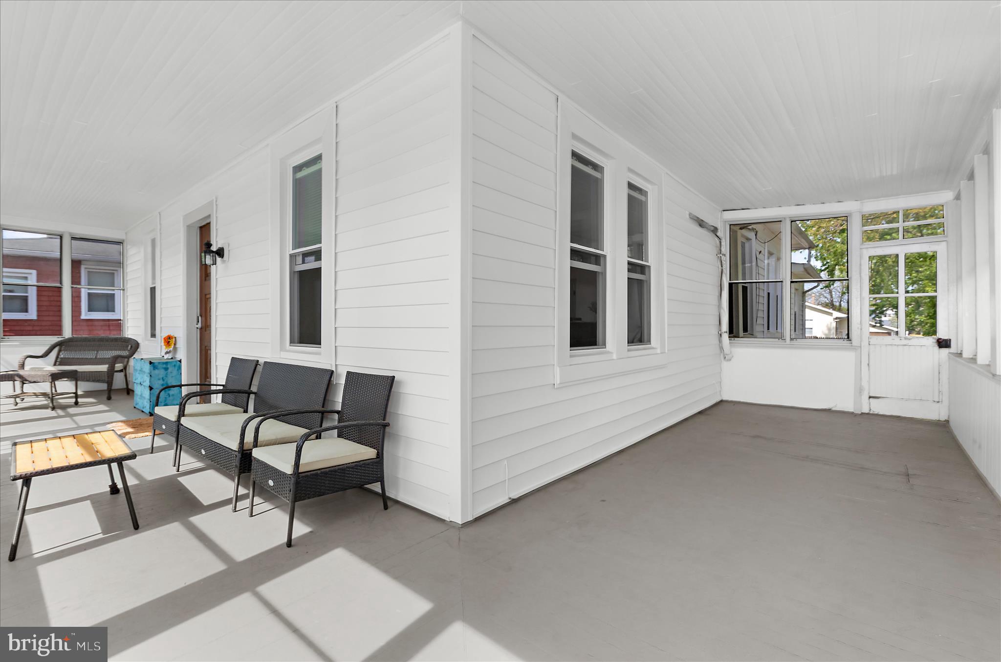 222 Wanda Road Pasadena, MD 21122 - Photo 5 of 34 a view of an empty room with lounge chair and windows