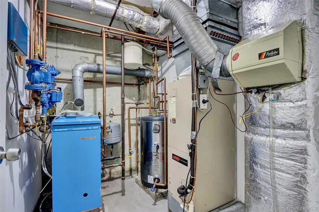 a living room with furniture wooden floor and a dining table