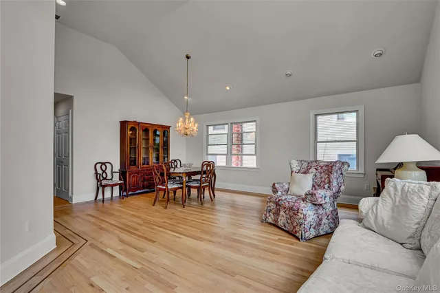 a kitchen with stainless steel appliances a stove a sink and a refrigerator
