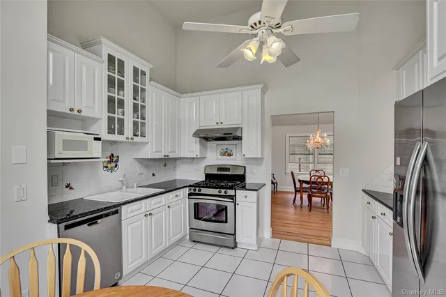 a bedroom with furniture and wooden floor