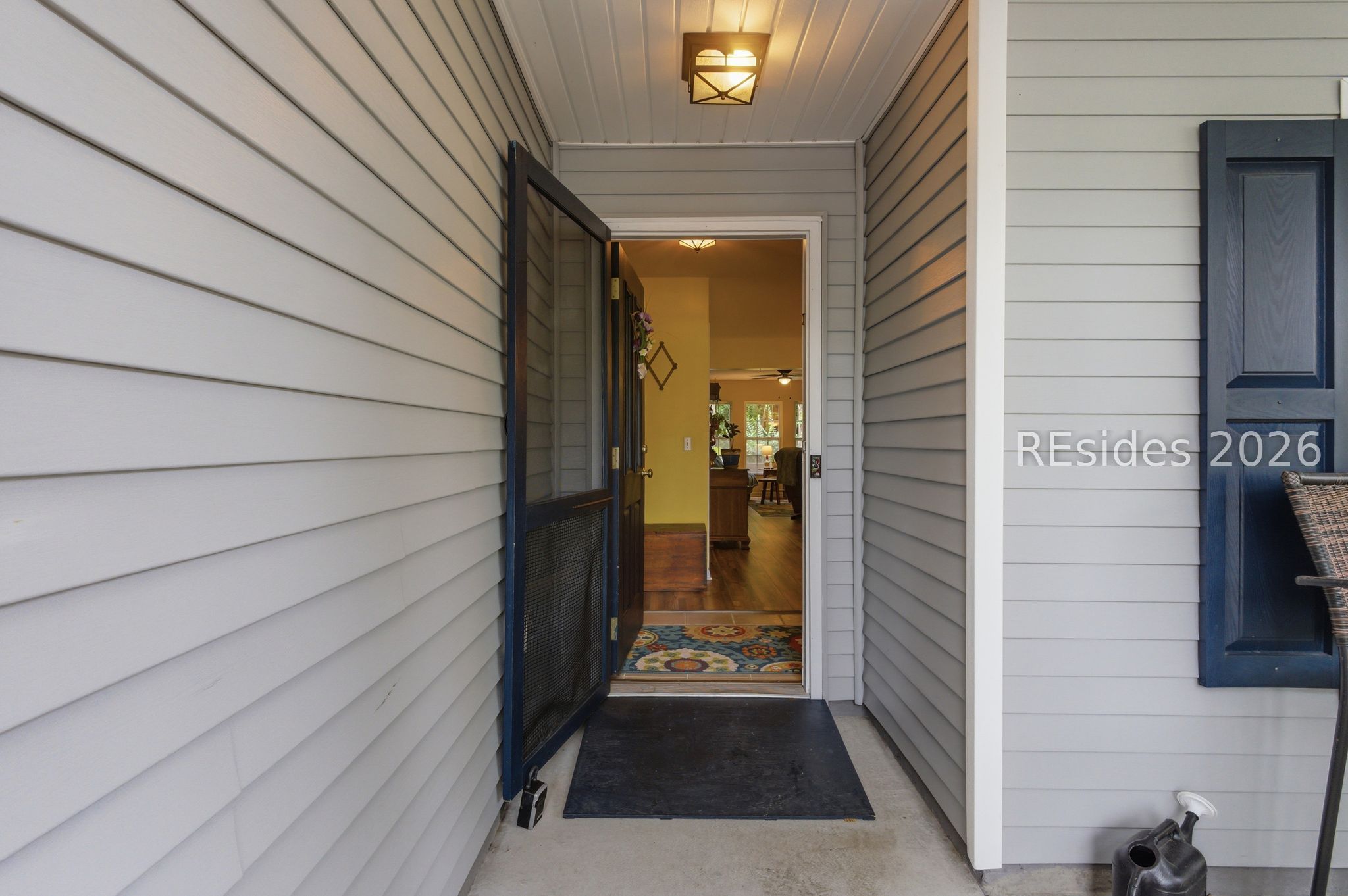 6 Hemlock Court Bluffton, SC 29910 - Photo 6 of 45 Entry way with screened door.