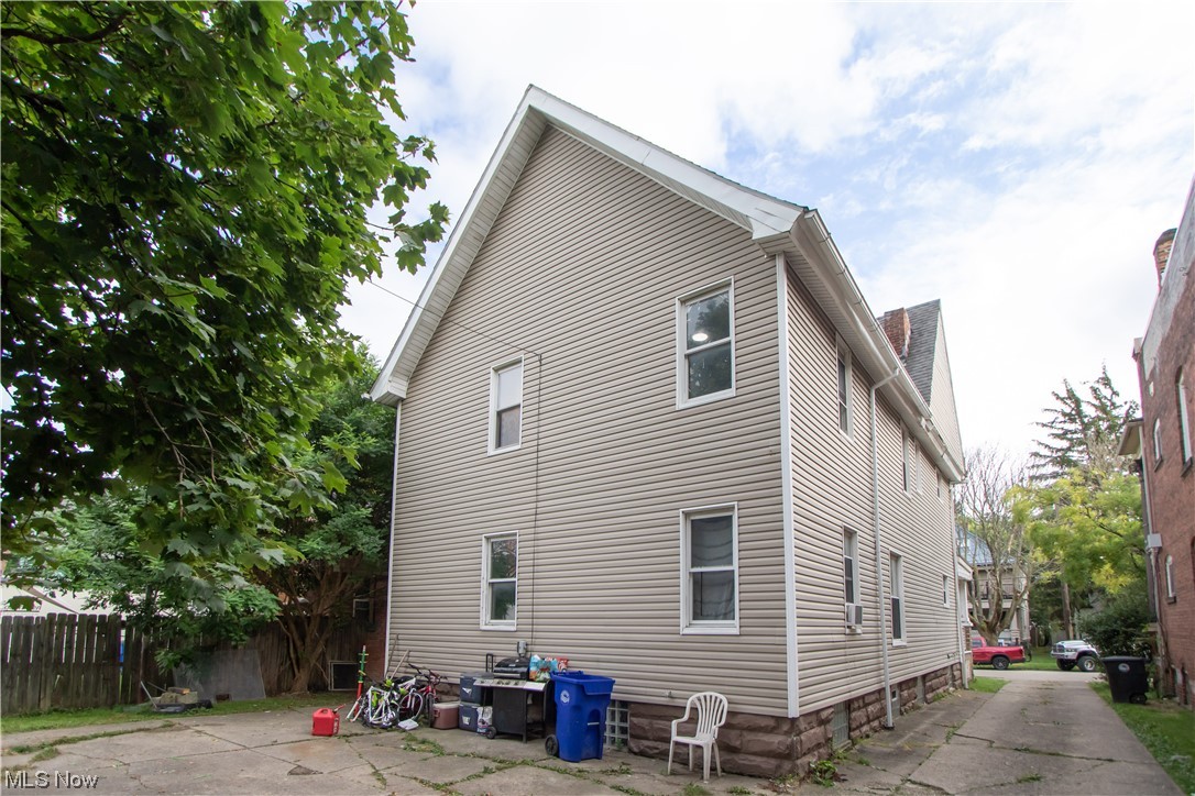 3816 Riverside Avenue Cleveland, OH 44109 - Photo 2 of 35 Back of property featuring a parking pad