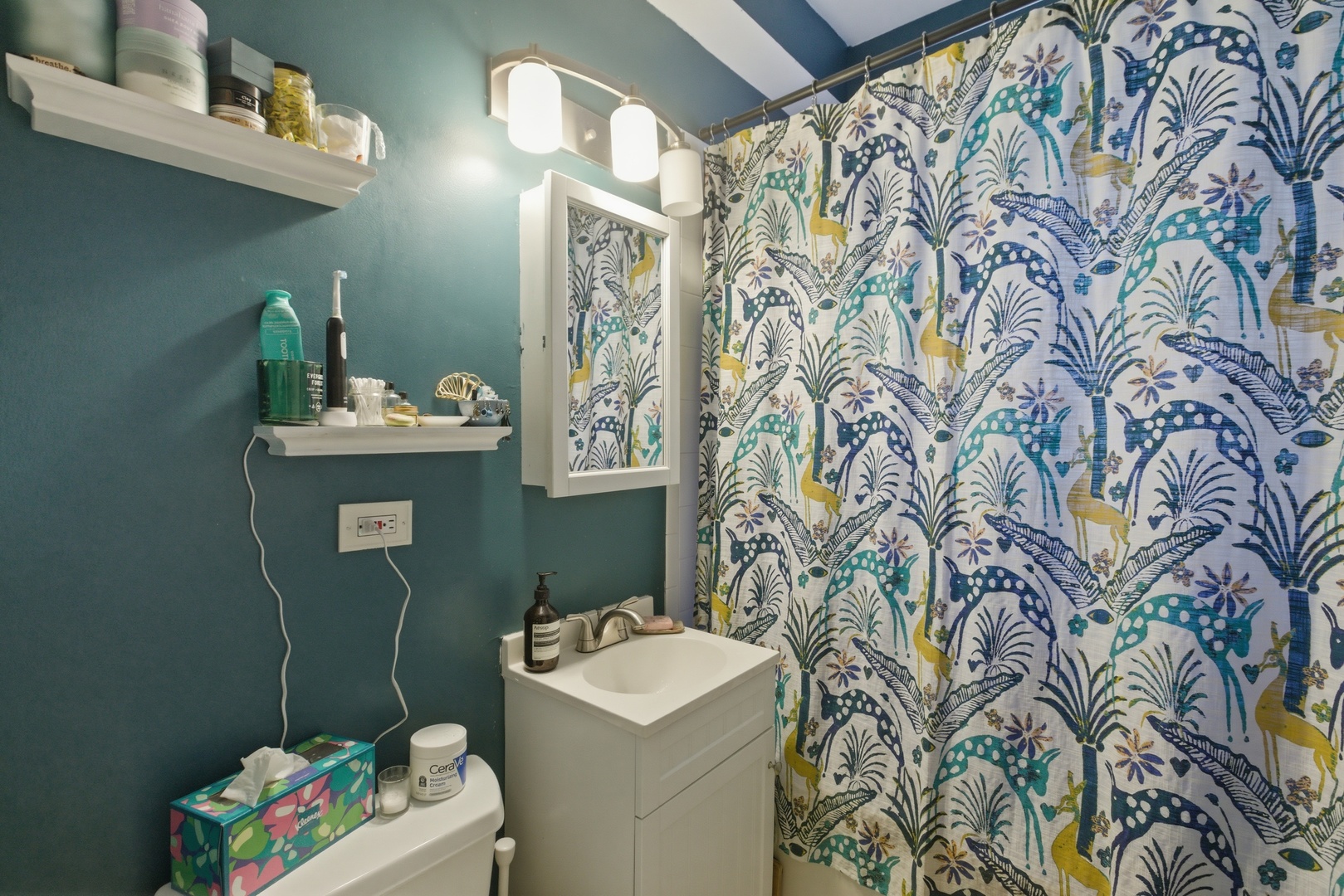 2544 West George Street, Unit 1 Chicago, IL 60618 - Photo 11 of 11 a bathroom with a sink toilet and vanity