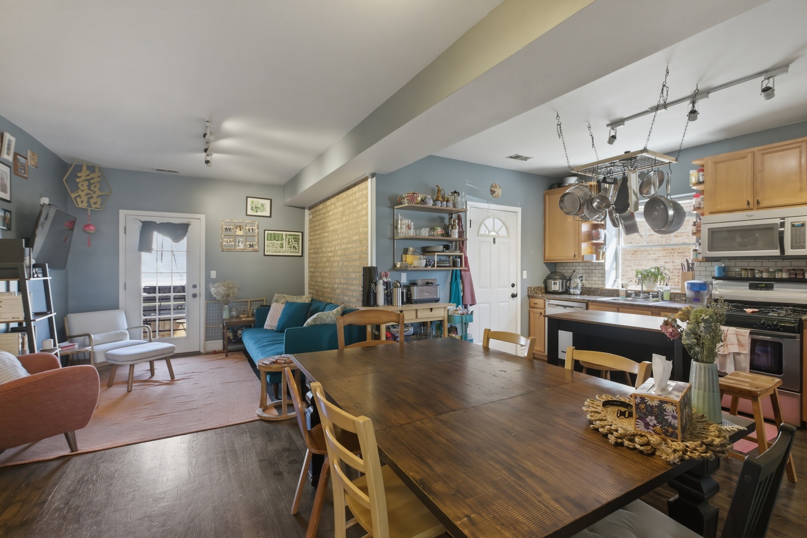 2544 West George Street, Unit 1 Chicago, IL 60618 - Photo 3 of 11 a living room with furniture and wooden floor