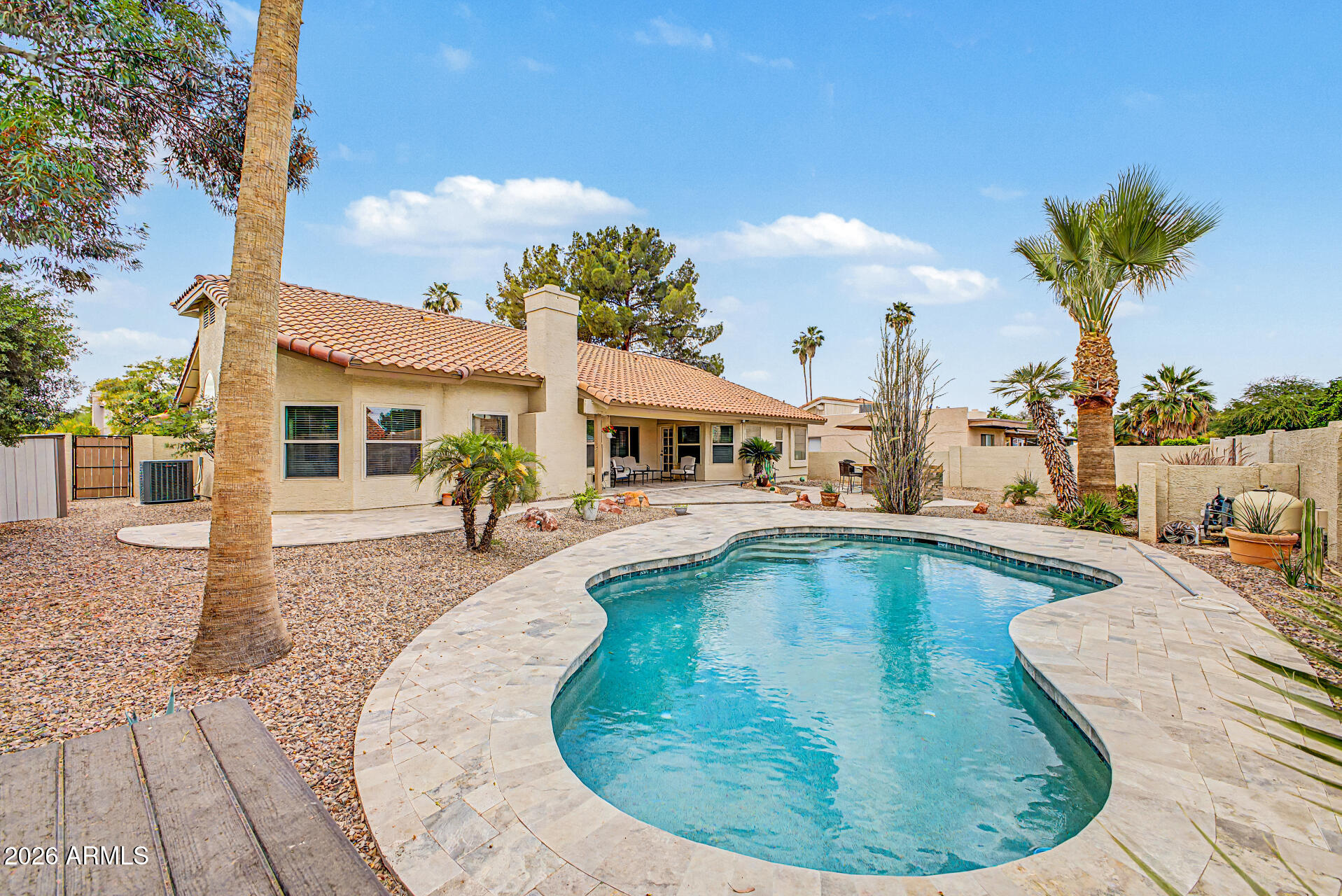 1924 East El Freda Road Tempe, AZ 85284 - Photo 15 of 56 a view of a house with swimming pool