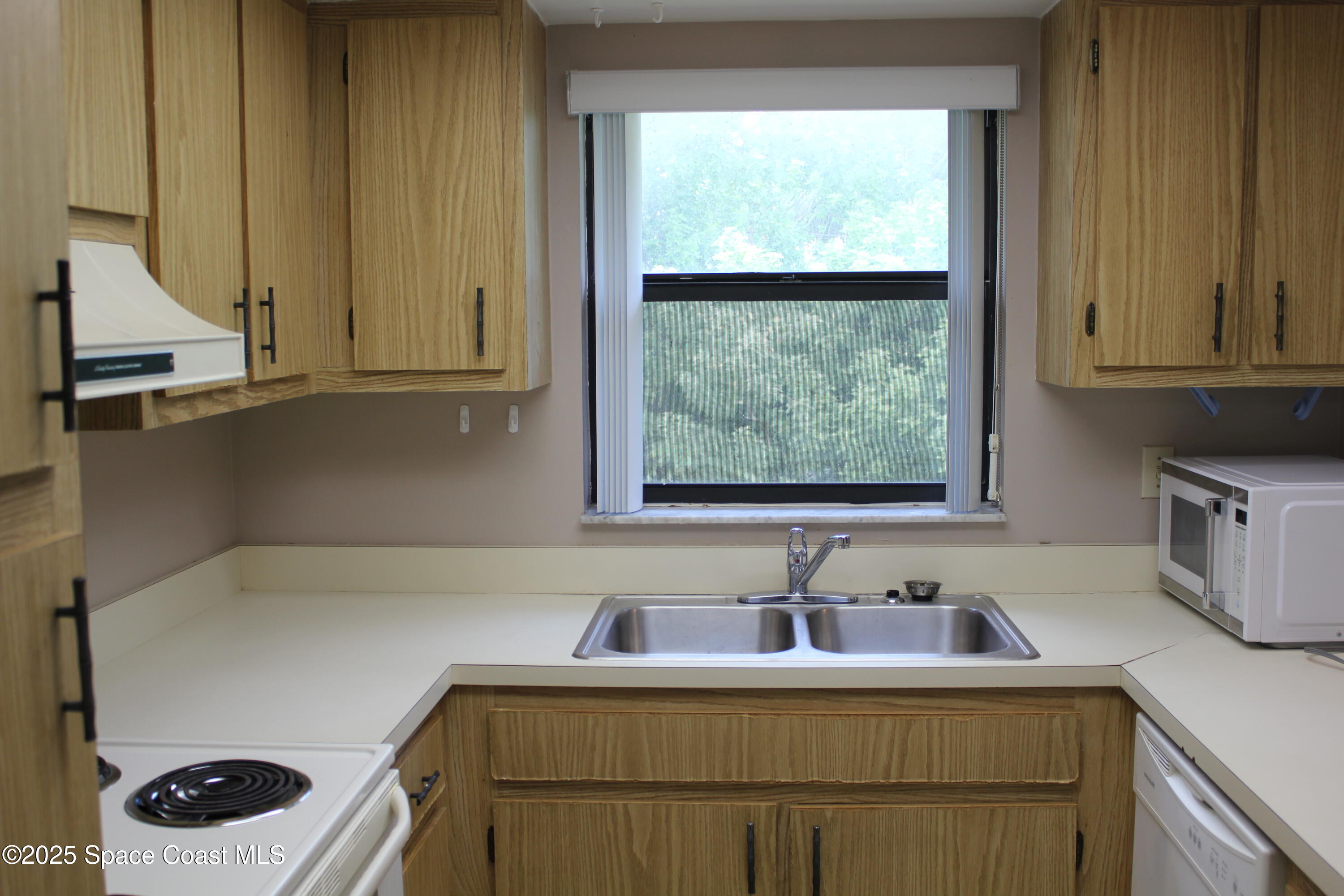 586 North Wickham Road, Unit 62 Melbourne, FL 32935 - Photo 5 of 19 IMG_5050