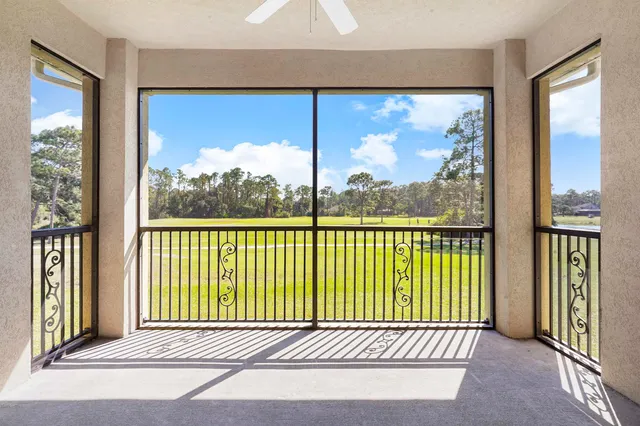 a view of a car park in front of house