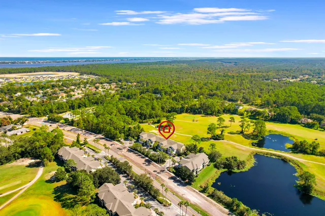 a view of an ocean and city