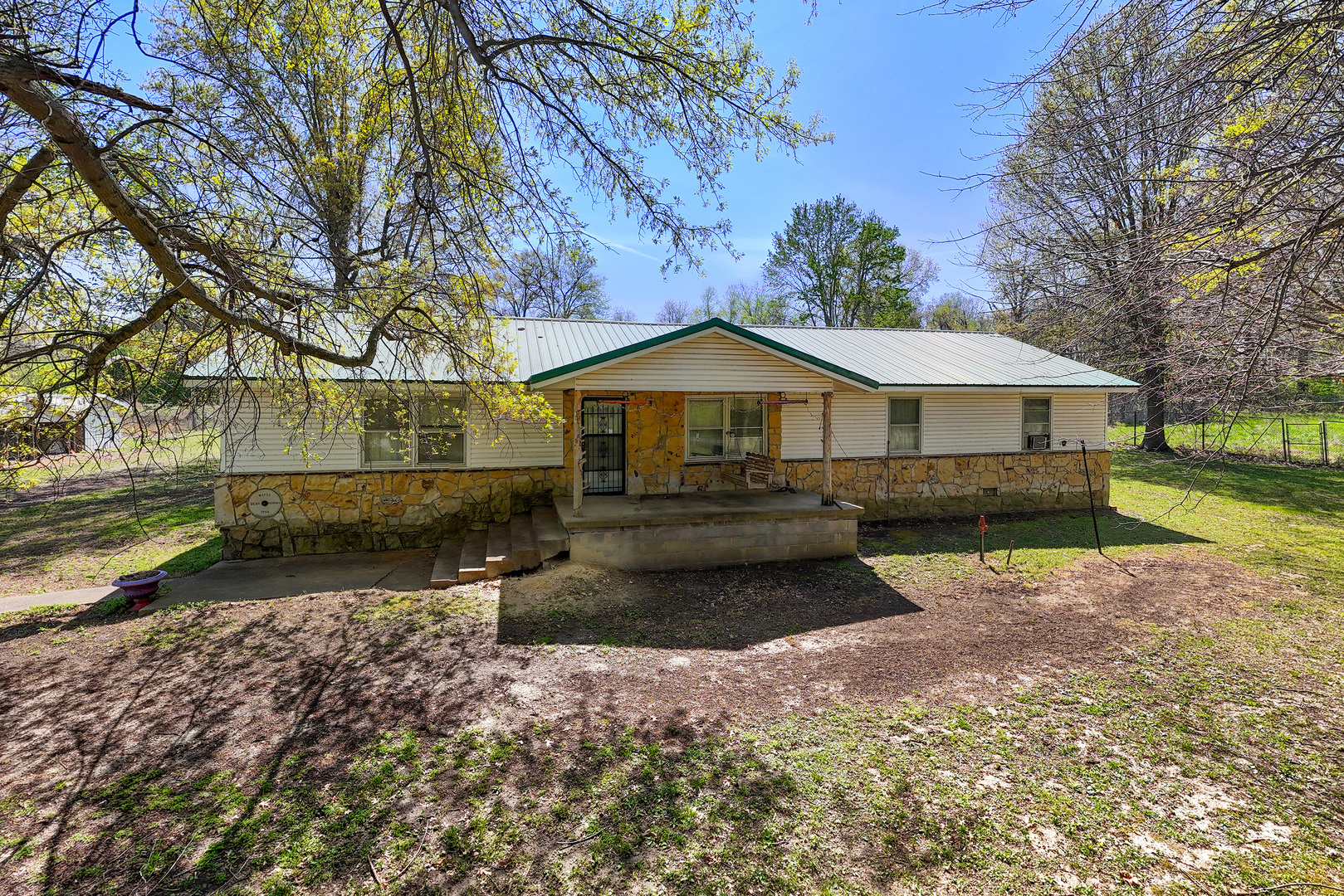 13849 Mustang Road Marion, IL 62959 - Photo 13 of 13 a front view of a house with garden