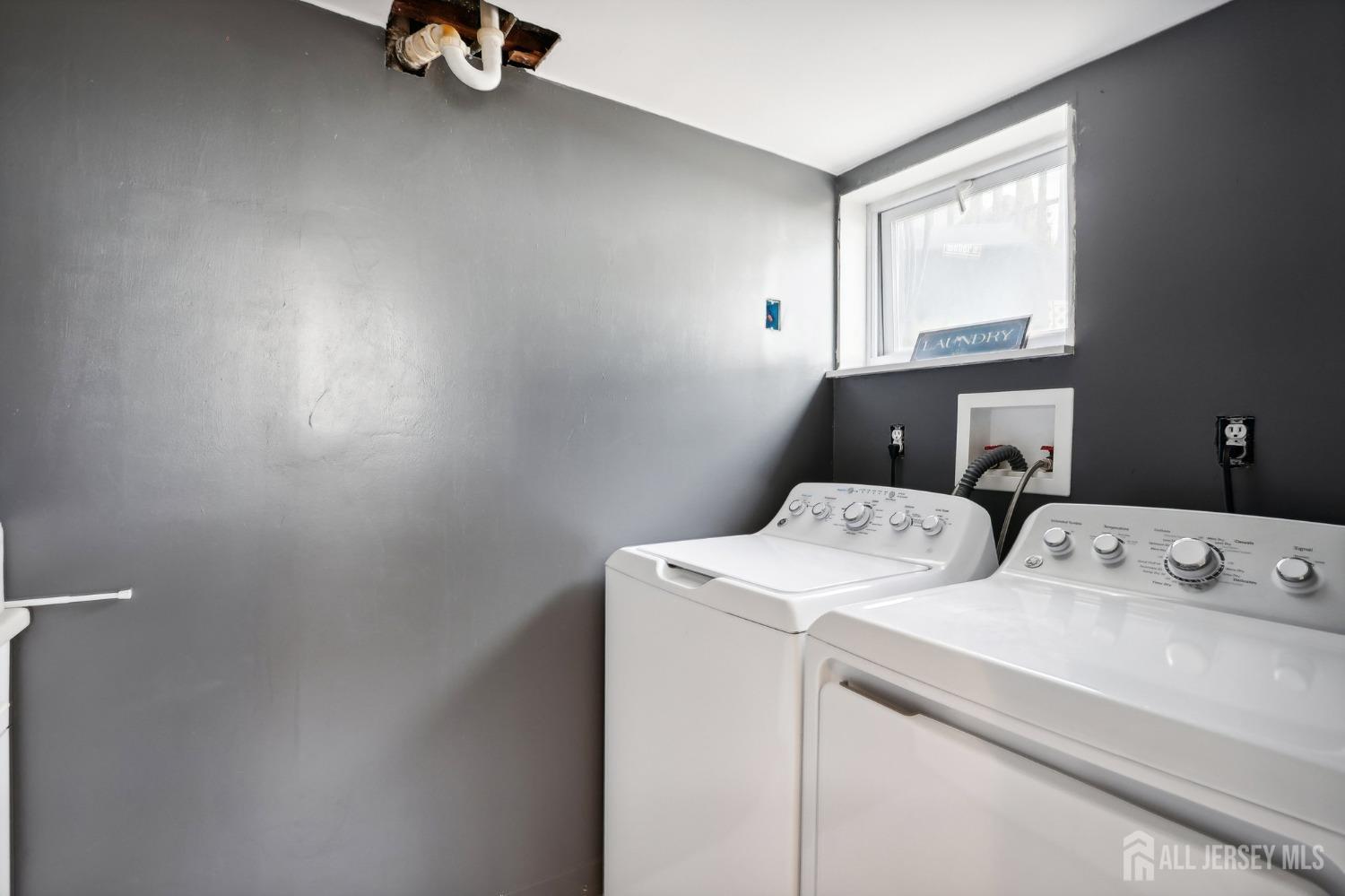 23 Brox Road Edison, NJ 08817 - Photo 19 of 33 a utility room with dryer and washer