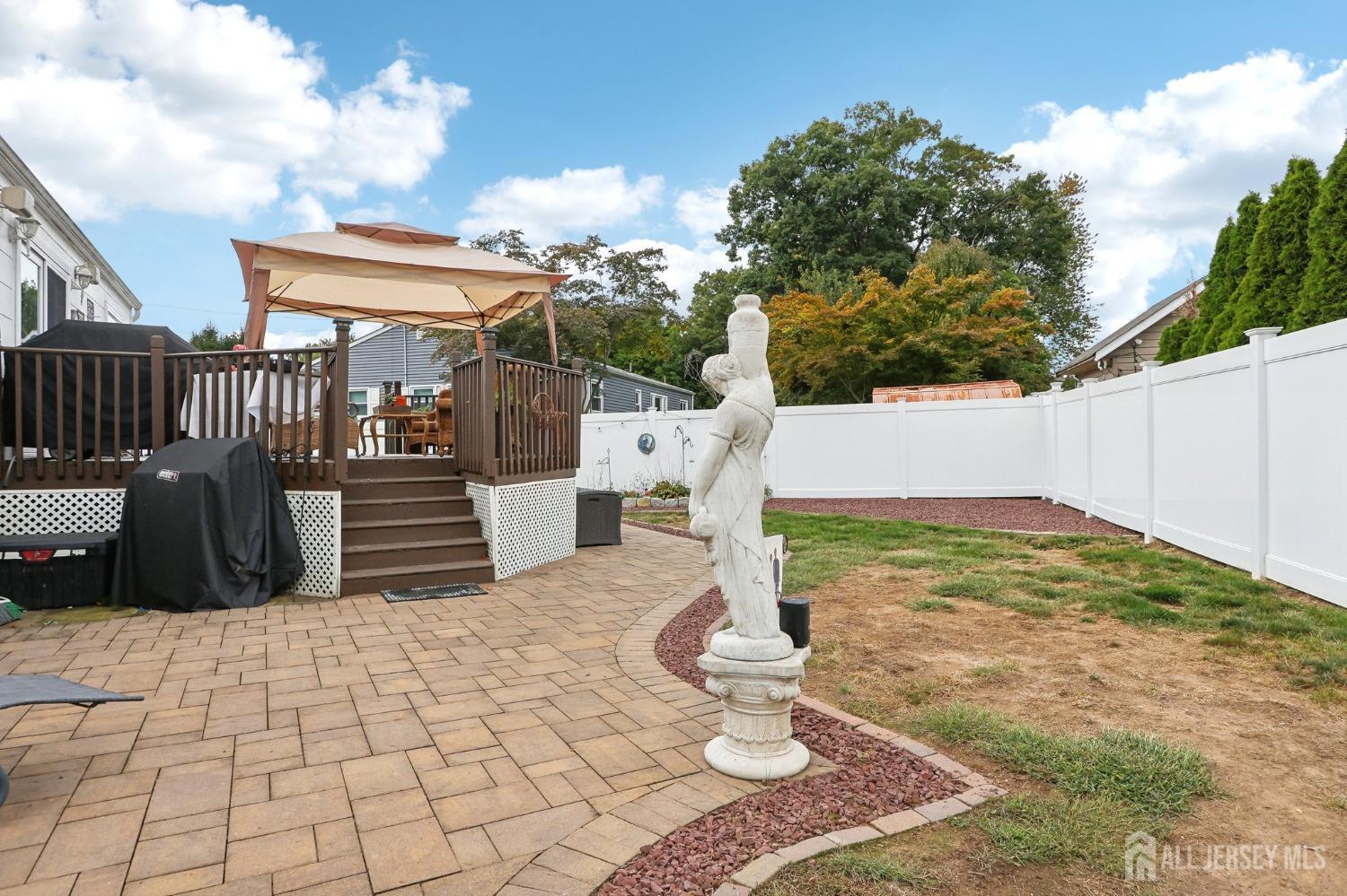 23 Brox Road Edison, NJ 08817 - Photo 27 of 33 a view of a backyard with sitting area