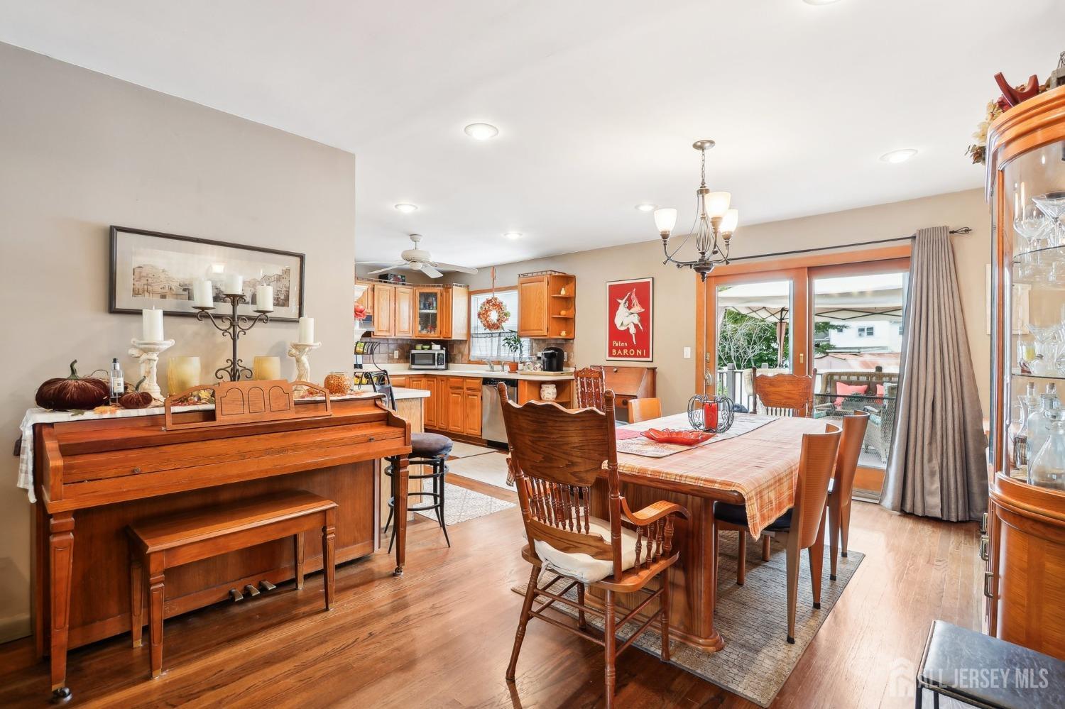 23 Brox Road Edison, NJ 08817 - Photo 6 of 33 a view of a dining room with furniture and wooden floor
