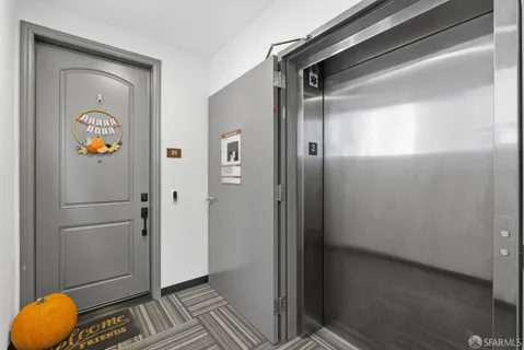 a view of bathroom with shower and mirror