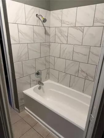 a bathroom with a sink and vanity