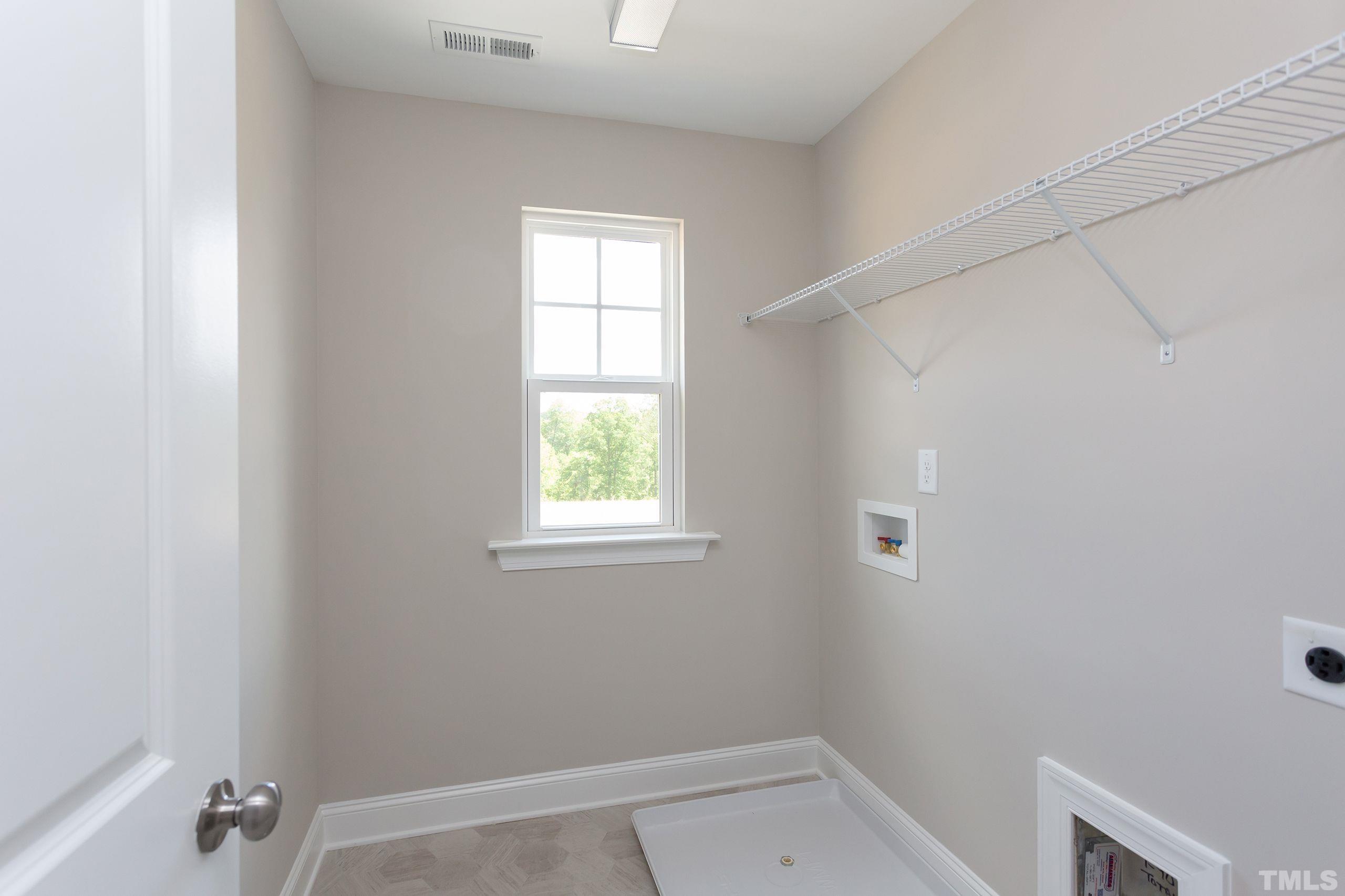 0 Pool Rock Road Henderson, NC 27536 - Photo 22 of 44 an empty room with a window