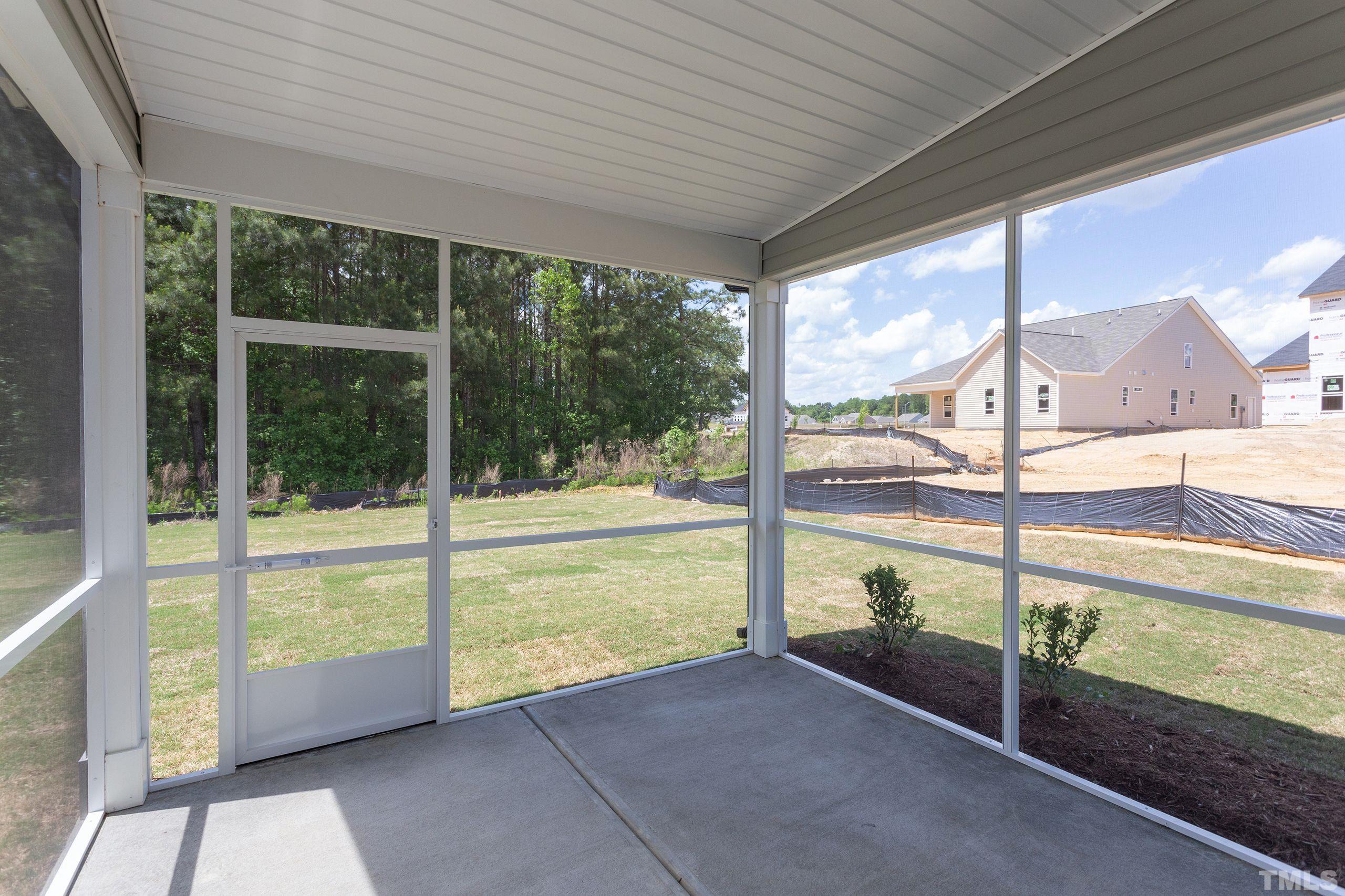0 Pool Rock Road Henderson, NC 27536 - Photo 39 of 44 a view of a porch with a floor to ceiling window